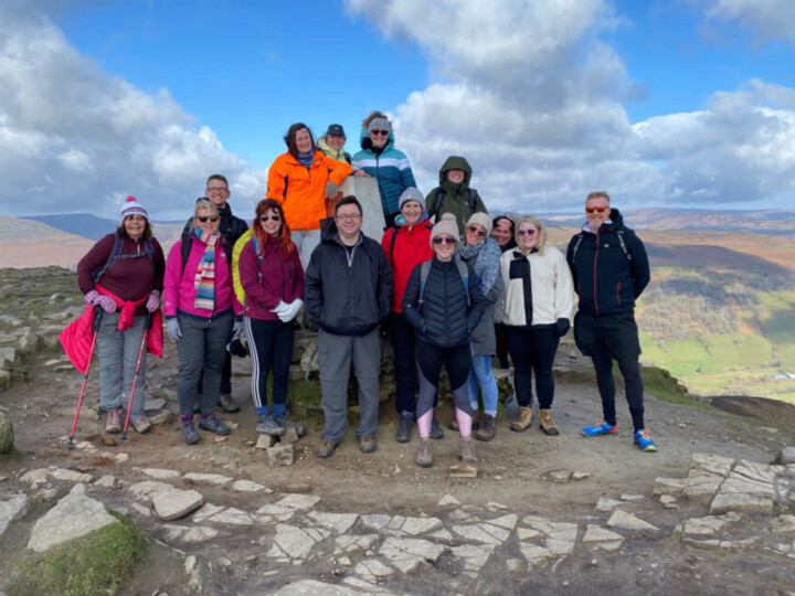 HeadsUp colleagues on a mountain top
